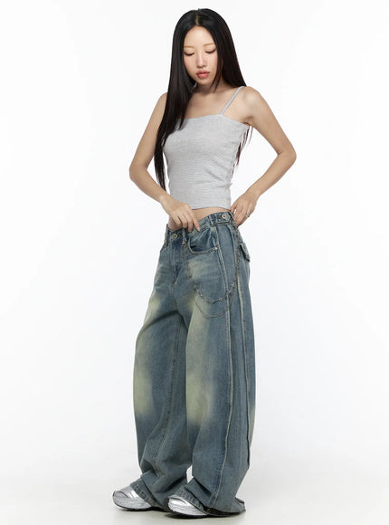 Striped Square Neck Cami CL524 light gray full-body angled front shot on model looking down adjusting waistband showcasing striped ribbed crop top fit