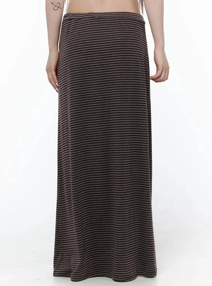 Striped Tie Maxi Skirt IL506 Brown back view on model showing smooth back panel of brown-black striped knit maxi skirt, no drawstring visible