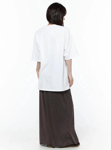 Striped Tie Maxi Skirt IL506 Brown back view on model styled with white oversized graphic tee, showing clean back panel and maxi hem