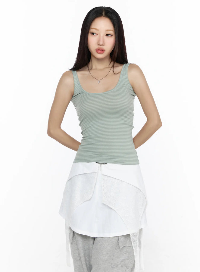 Striped U-Neck Tank Top CL524 Green front shot on model with scoop neckline ribbed texture styled with white layered skirt