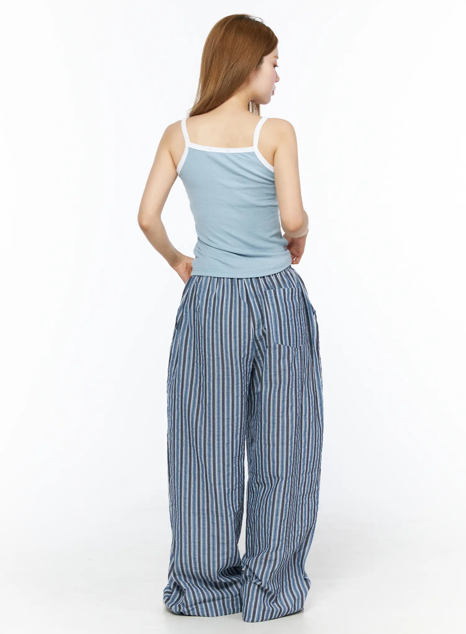 Striped Wide-Leg Trousers CL502 Blue back full-body shot on model with cami top showing rear silhouette and pooling hem of wide-leg striped trousers