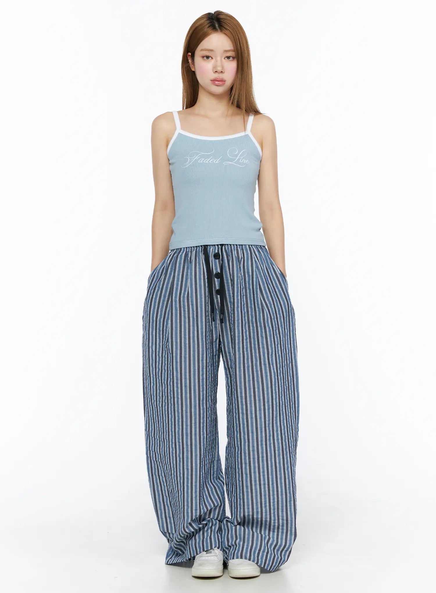 Striped Wide-Leg Trousers CL502 Blue front full-body shot on model styled with light blue cami top standing straight showing oversized wide-leg fit