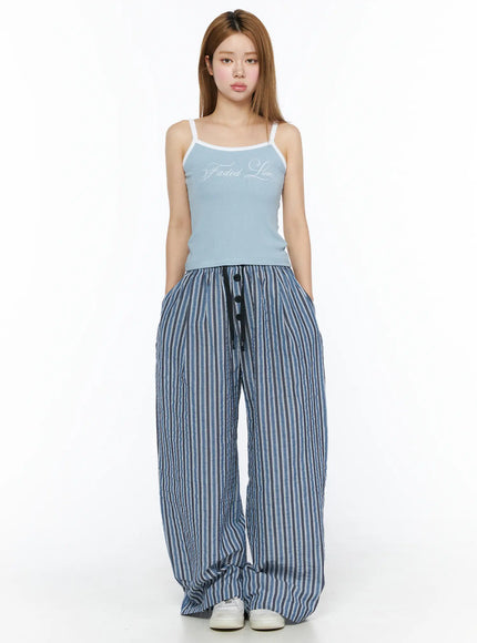 Striped Wide-Leg Trousers CL502 Blue front full-body shot on model styled with light blue cami top standing straight showing oversized wide-leg fit