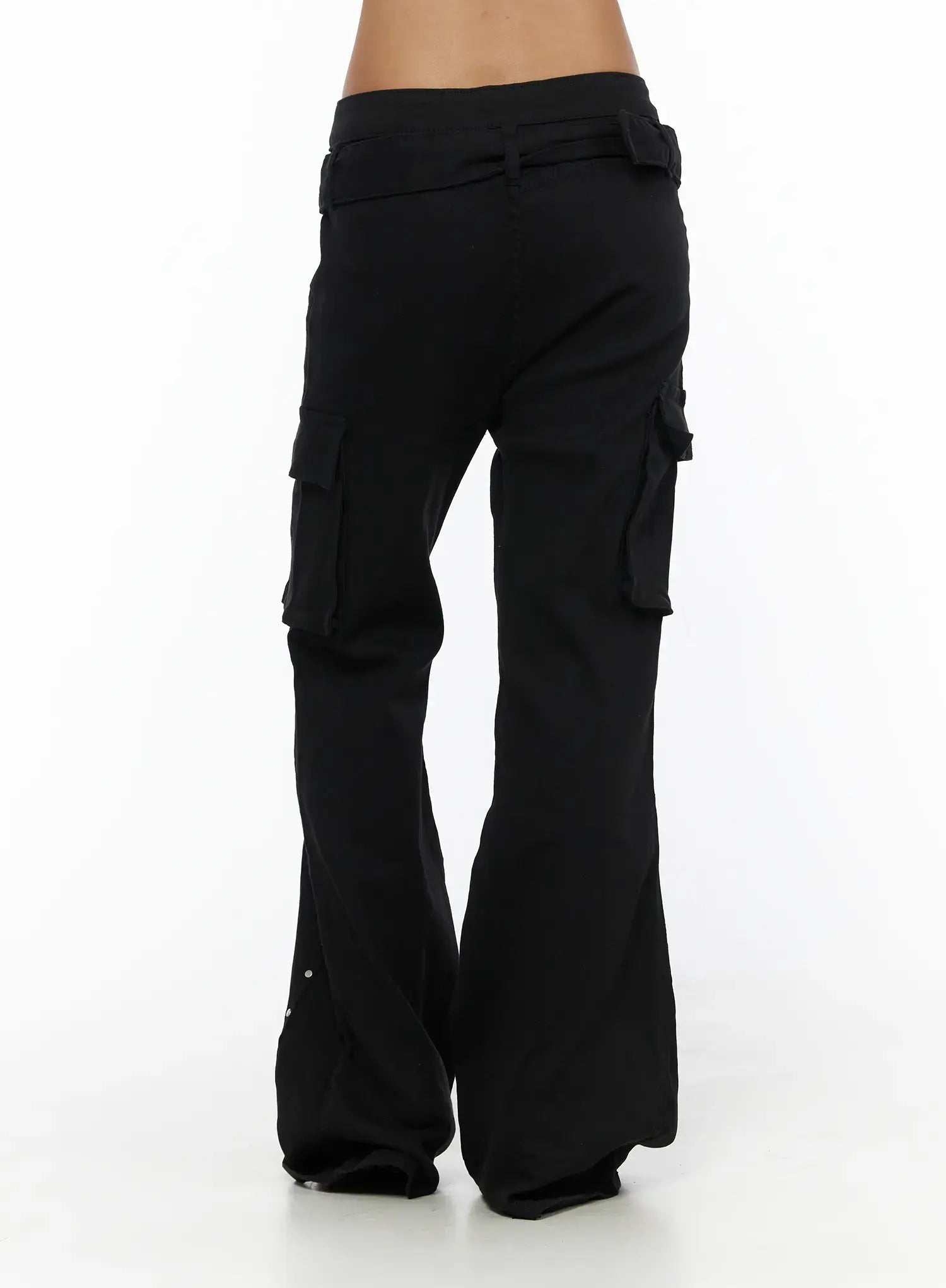 Studded Bootcut Pants CL503 Black back close-up on model showing low-rise waistband, belt loops, rear cargo pockets, and wide flared leg