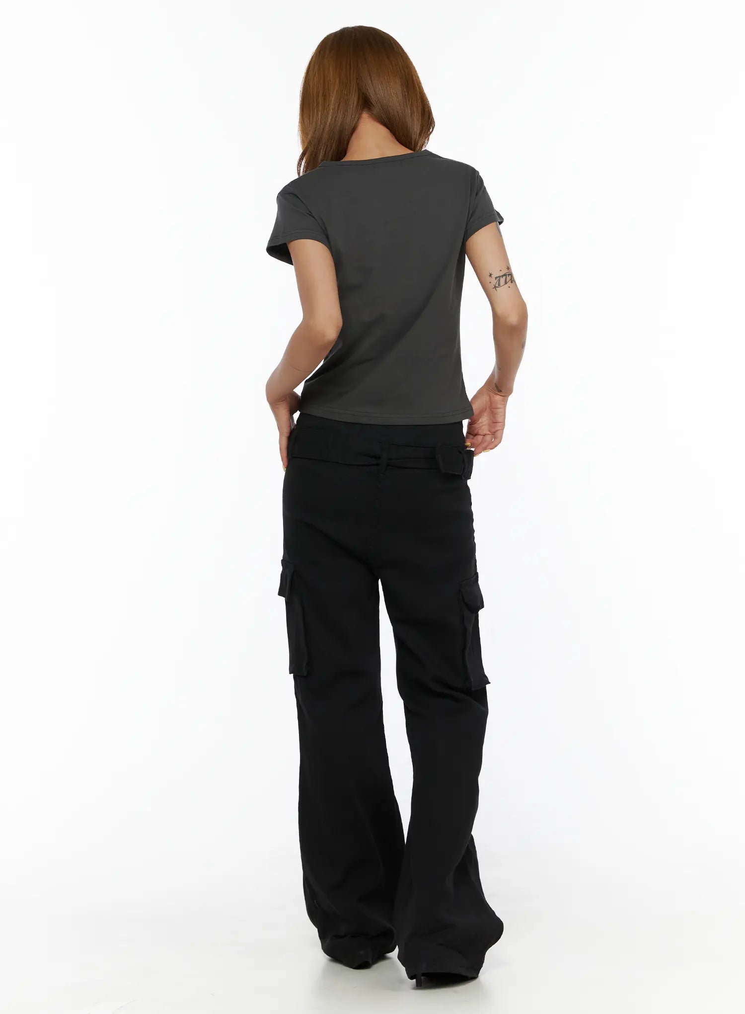 Studded Bootcut Pants CL503 Black full-length back view on model wearing grey crop tee, showing back cargo pockets and wide bootcut flare