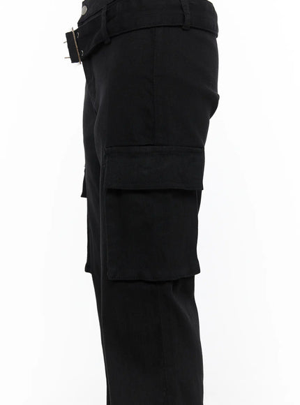 Studded Bootcut Pants CL503 Black side detail close-up of thigh showing large double cargo pocket flap and buckle belt at hip