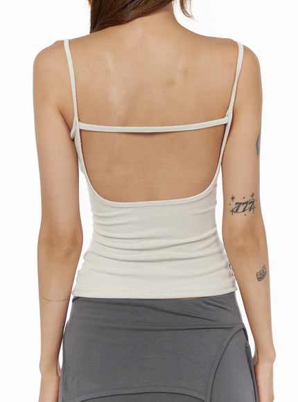 Studded Detail Tank Top CL503 Beige close-up back shot on model, low open back with horizontal crossbar strap, ribbed texture, spaghetti straps detail