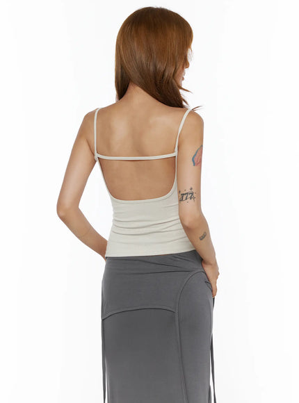 Studded Detail Tank Top CL503 Beige close-up back shot on model, deep open back with horizontal strap across, ribbed knit construction clearly visible