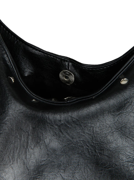 Studded Large Hobo Bag CL527 Black flat hanger front view showing full silhouette of oversized slouchy hobo bag with silver studs along strap and opening