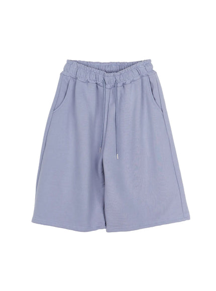 Studded Sweatshorts CU530 Blue flat-lay front view wide-leg cut elastic ruched waistband drawstring tie side pockets dusty blue fleece sweatshort