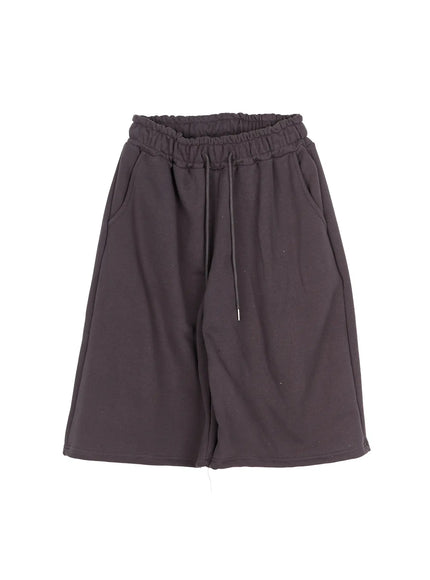 Studded Sweatshorts CU530 Cream flat-lay front view wide-leg silhouette elastic ruched double waistband drawstring tie side pockets sweatshort fleece