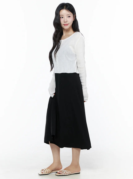 Summer Ribbed Crop Cardigan IU525 White side shot on model showing cropped length ribbed knit construction and long sleeves over black midi skirt