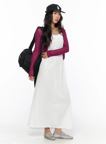 Summer Sheer Crop Cardigan CL510 Purple full-body side shot on model with black cap and backpack showing cropped silhouette over white maxi dress