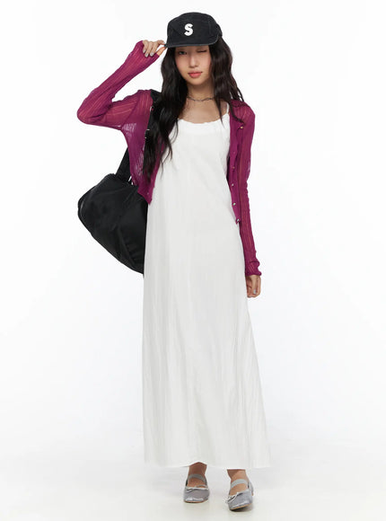Summer Sheer Crop Cardigan CL510 Purple full-body front shot on model styled with white maxi dress, black cap and bag, silver ballet flats