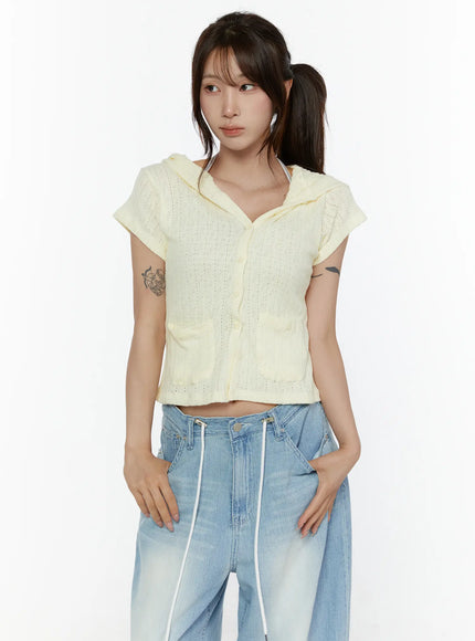 Summer Short Sleeve Hooded Knit Cardigan CL507 Yellow upper-body front shot on model looking sideways, open hood collar and button-front detail with dual patch pockets visible