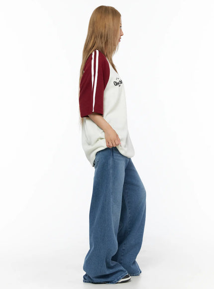 Suna Washed Wide Leg Jeans CU523 Blue side full-length shot on model showing oversized wide leg silhouette and front seam detail