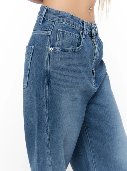 Suna Washed Wide Leg Jeans CU523 Blue close-up detail of side hip area showing side pocket zipper fly hardware and washed denim
