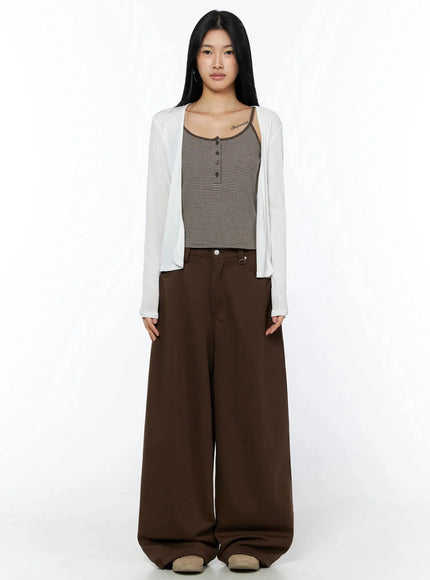 Tailored Wide Leg Sweatpants IL509 Brown full-length front shot on model styled with white open cardigan and striped cami, standing with hands clasped