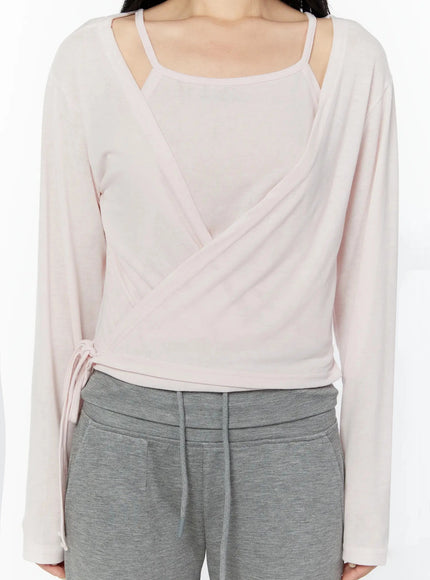Tank And Layered Wrap Cardigan IU524 Pink close-up front shot showing crossover wrap neckline cami strap layered detail and side tie