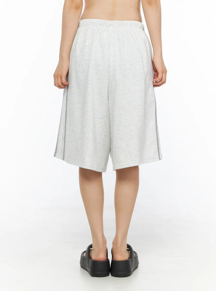 Tank Top and Track Shorts Set CL501 Light gray back model shot of wide-leg shorts, elastic waistband, side stripe detail, black platform sandals, clean back view