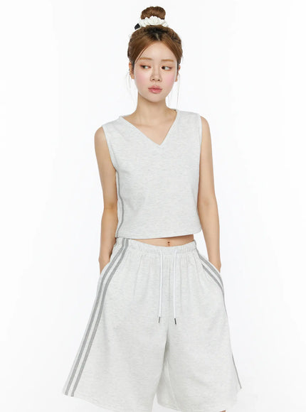 Tank Top and Track Shorts Set CL501 Light gray upper-body front model shot, V-neck sleeveless crop top with side stripe detail, wide-leg drawstring shorts