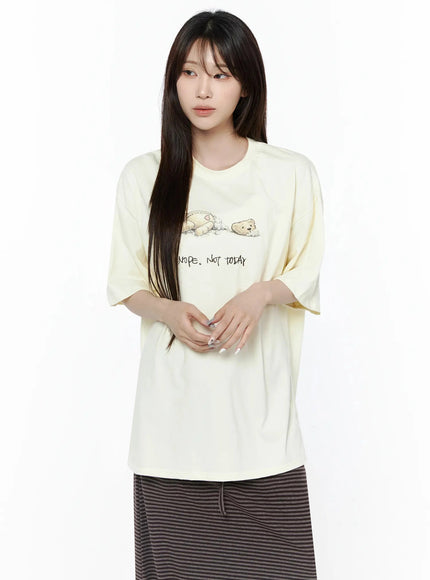 Teddy Graphic Oversize T-Shirt IL506 Yellow front half-body model hands clasped bear and NOPE NOT TODAY graphic print crew neck