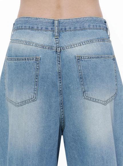 Teo Wide Leg Jeans IL506 Blue close-up back detail of waistband and dual back pockets with contrast stitching and faded wash denim texture