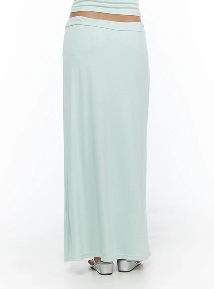 Tie-Waist Maxi Skirt CL503 Mint back shot on model showing smooth stretch fabric and folded low-rise waistband with silver heeled sandals