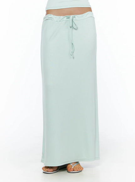 Tie-Waist Maxi Skirt CL503 Mint close-up front shot on model showing ribbed low-rise waistband with tied drawstring detail and soft knit texture