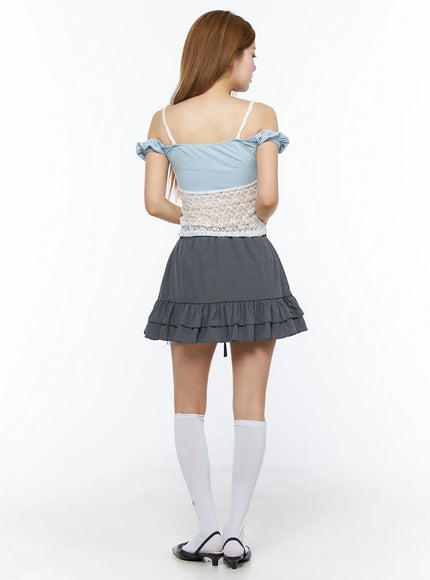 Tiered Ruffle Mini Skirt CL501 Dark gray full-body back shot on model paired with blue lace cami top showing back skirt silhouette and ruffle tiers