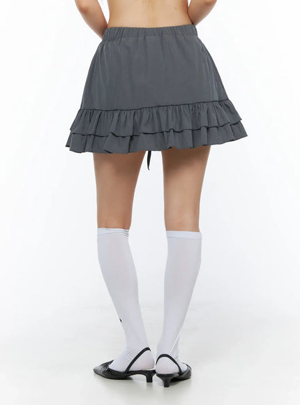 Tiered Ruffle Mini Skirt CL501 Dark gray back shot on model displaying double-tiered ruffle hem elastic waistband and back silhouette