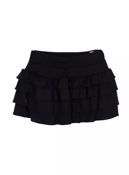 Tiered Ruffle Mini Skirt IU525 Black flat-lay front showing four-tier ruffle layers, structured waistband, and overall mini length silhouette
