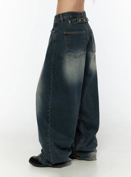 Tuli Back-Belt Detail Baggy Jeans CU529 Dark blue side shot on model showing back pocket snap-button belt detail and oversized wide-leg denim silhouette