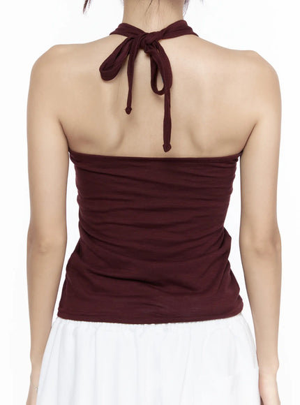Twist Halter Top CL524 Dark red close-up back crop view on model showing neck tie halter knot and open back with smooth fitted jersey fabric