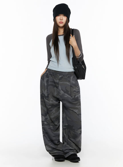 Two-Tone Long Sleeve Top IL523 Light blue full-body front shot on model with black beanie and shoulder bag, styled with dark camo wide-leg sweatpants
