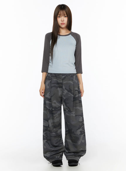 Two-Tone Long Sleeve Top IL523 Light blue full-body front shot on model arms at sides, paired with grey camo wide-leg sweatpants, clean straight pose