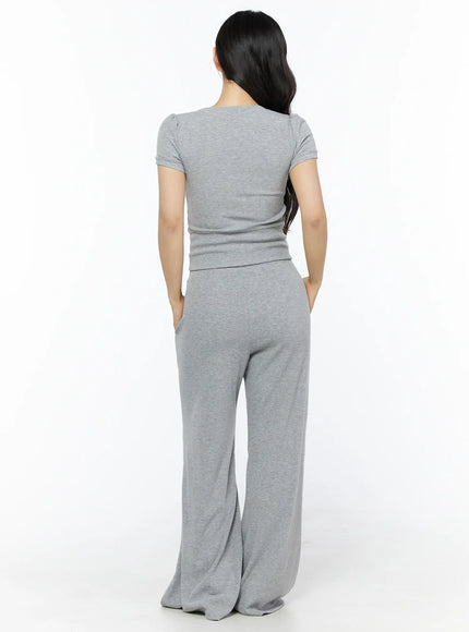 Two-Way Top & Sweatpants Set IU525 Gray back full-length shot on model hands in pockets, showing ribbed top back and wide-leg pants silhouette