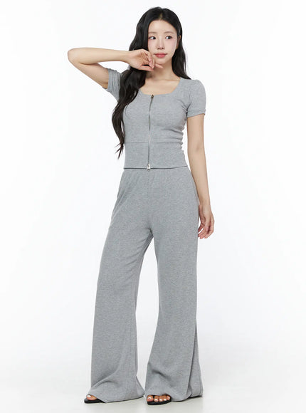Two-Way Top & Sweatpants Set IU525 Gray three-quarter front shot on model with arm raised, showing full ribbed set with flared pants