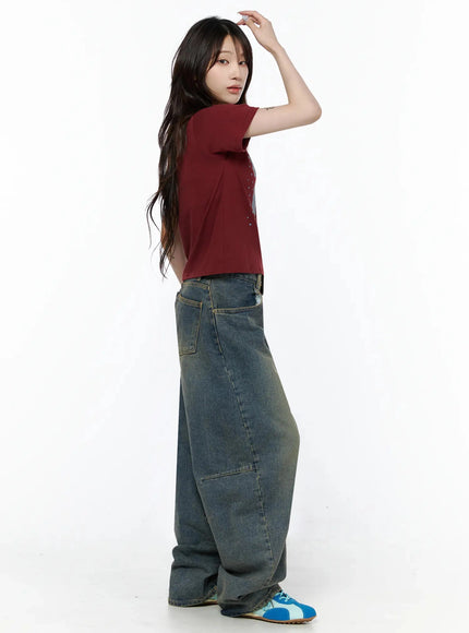 Unicorn Graphic Crop T-Shirt IL506 Dark red side model shot showing slim cropped silhouette short sleeve profile styled with wide-leg jeans and blue sneakers
