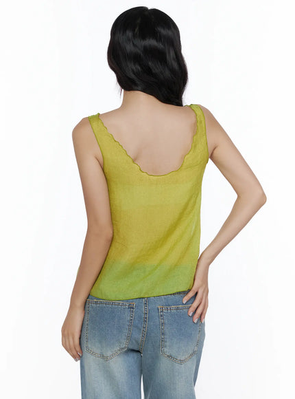 V-Neck Layered Sleeveless Blouse CL510 Green back shot on model showing scalloped back neckline wide straps and semi-sheer chiffon texture with jeans