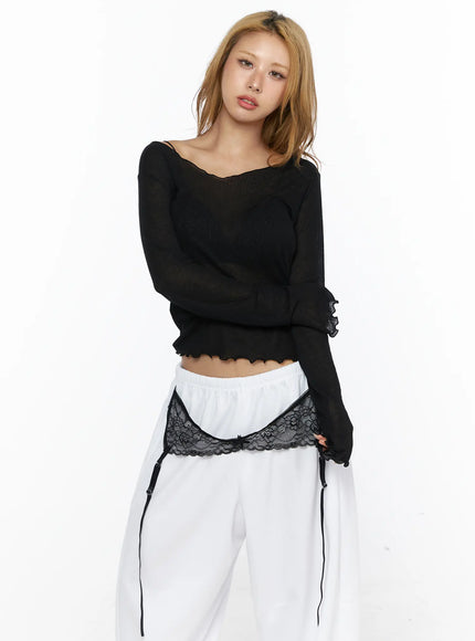 V-Neck Lettuce Trim Sheer Long Sleeve Top CL528 Black front close-up on model showing V-neckline sheer ribbed fabric lettuce trim hem and cuffs