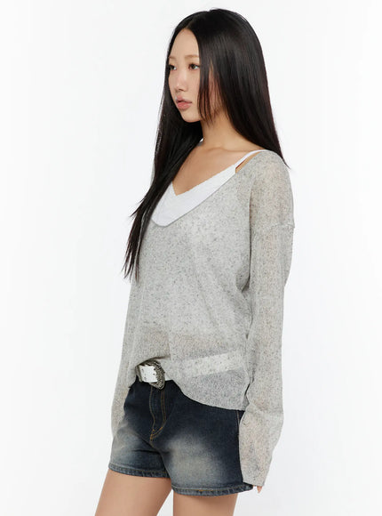 V-Neck Lightweuight Knit Top CU526 Light Gray side-angle view on model, deep V-neckline with white cami layering visible, relaxed boxy silhouette