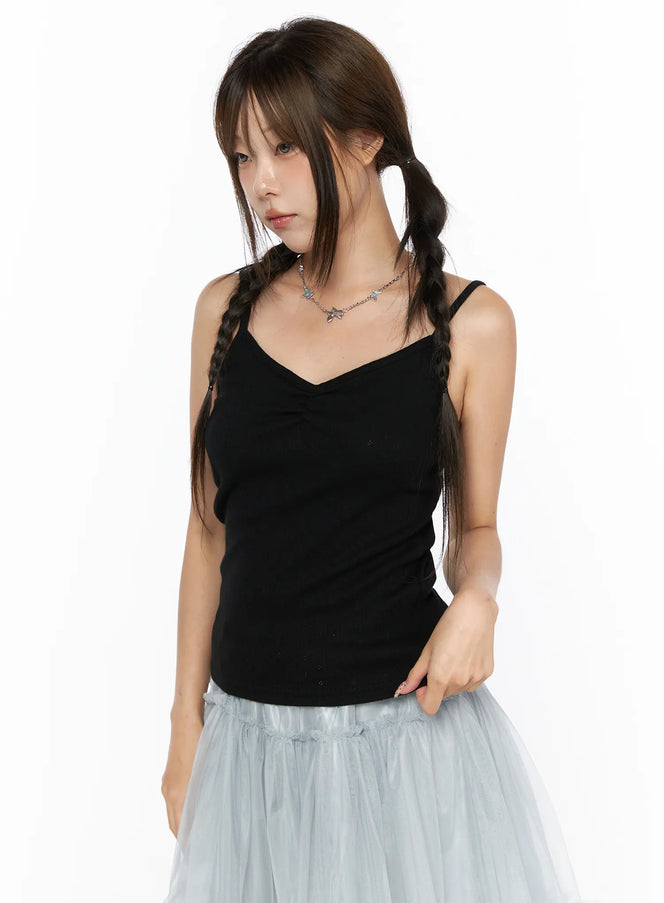 V-Neck Pointelle Cami Top CL514 Black close-up front view on model with V-neckline ruched detail styled with blue tulle skirt and chain necklace