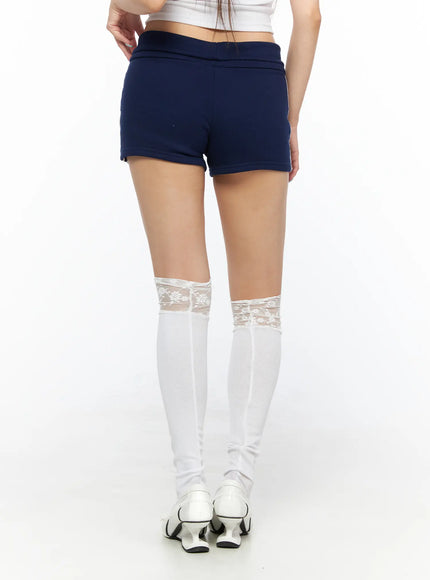 Varsity Athletic Shorts CL514 Dark blue back shot on model showing clean plain rear panel fold-over waistband and lace over-the-knee socks styling