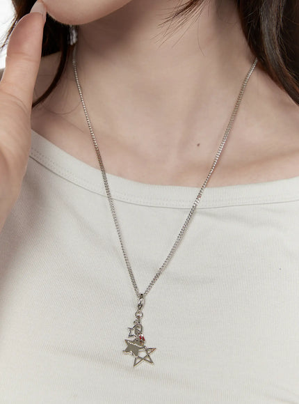 LEWKIN Vega Star Layer Necklace IL517 Silver front model shot worn on neck over white top showing layered chain and multi-star charm pendant