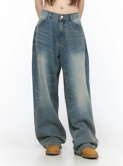 Vexi Washed Baggy Jeans CL523 Blue front full-length shot on model showing complete wide-leg silhouette, washed denim texture, and pooling hem over tan chunky boots