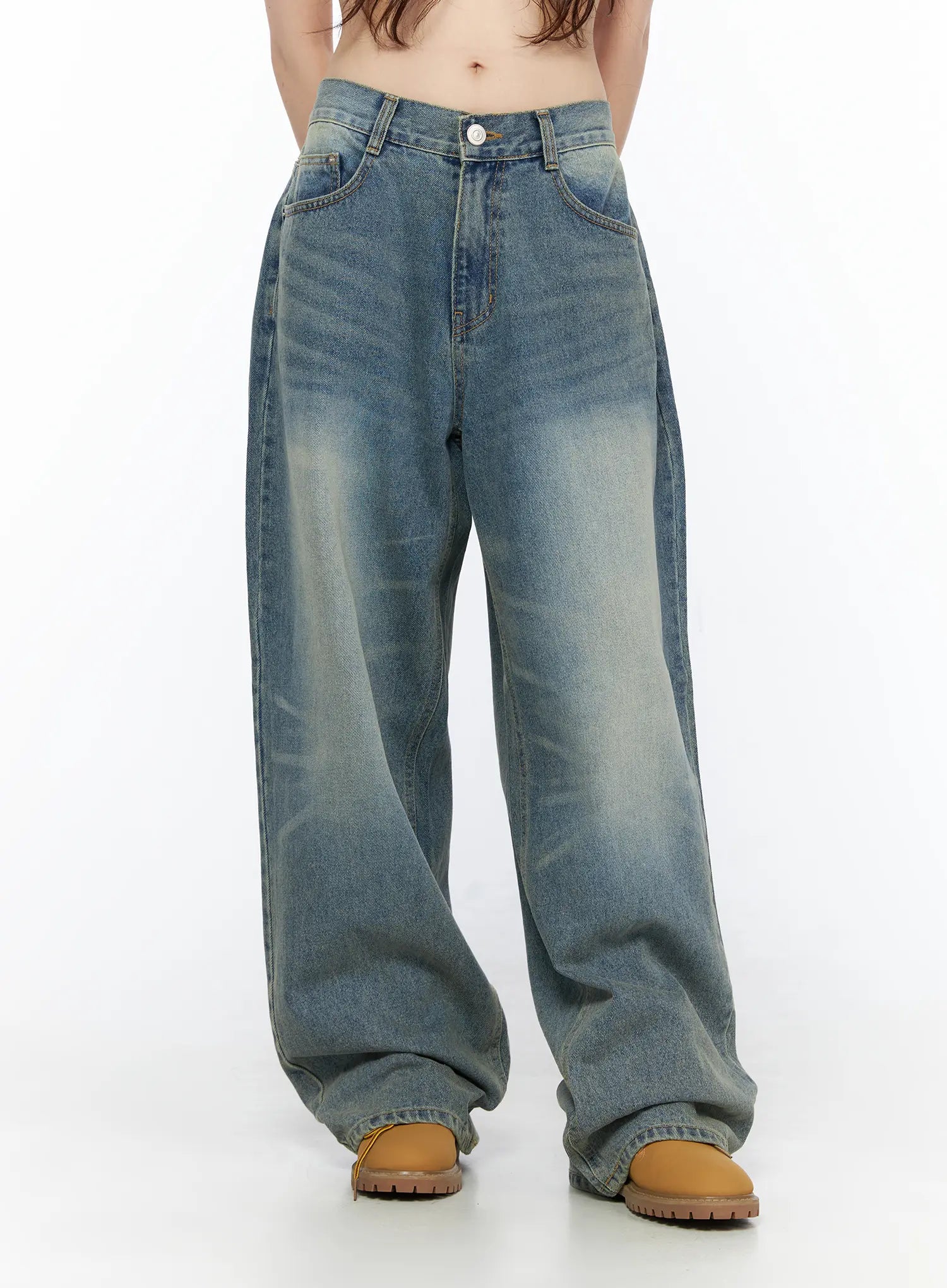 Vexi Washed Baggy Jeans CL523 Blue front full-length shot on model showing complete wide-leg silhouette, washed denim texture, and pooling hem over tan chunky boots