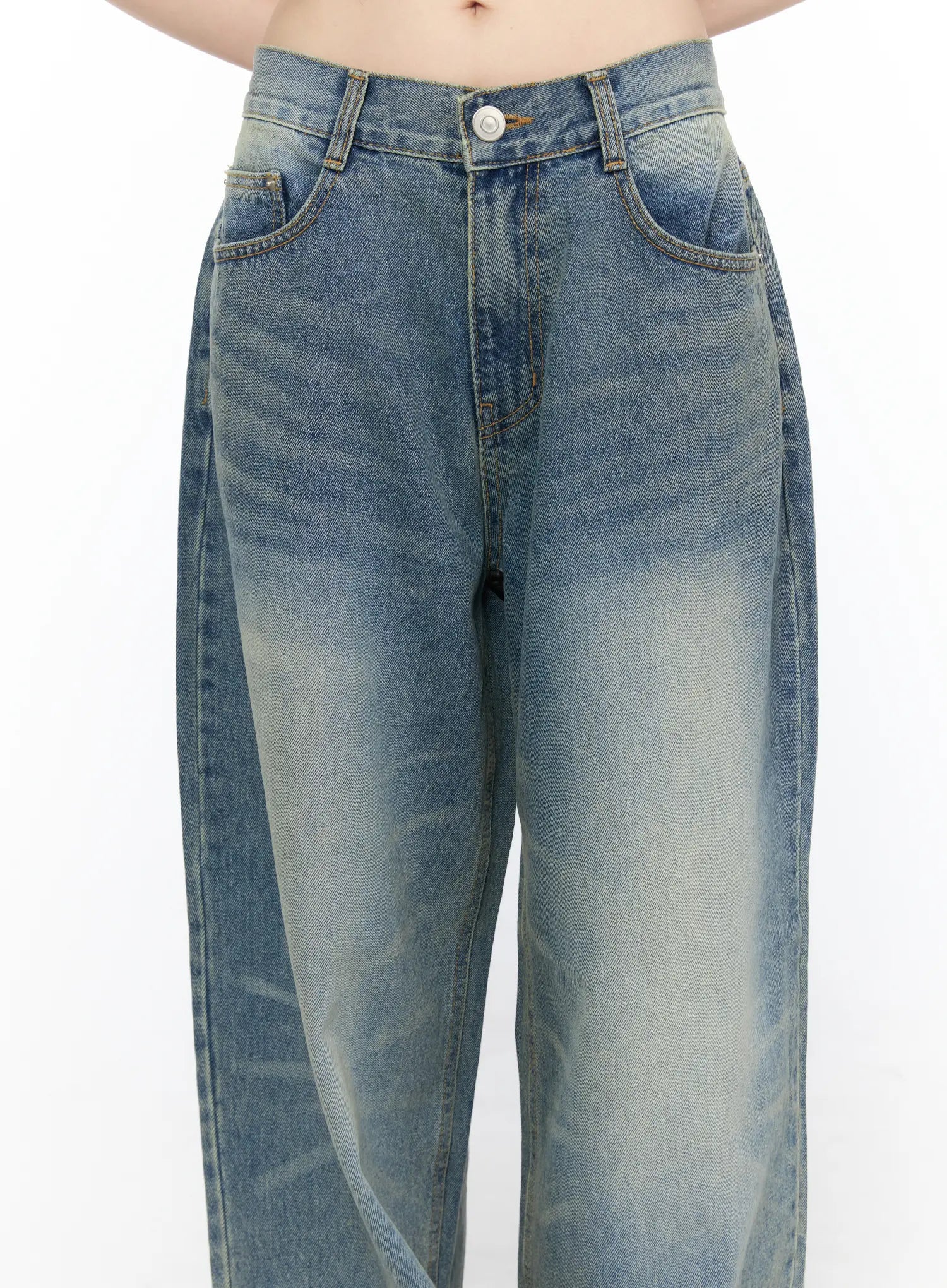 Vexi Washed Baggy Jeans CL523 Blue close-up detail of front waistband, button closure, belt loops, and front pockets highlighting gradient sun-faded denim wash