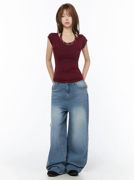 Veya Washed Baggy Jeans IU525 Blue full-length front shot on model with hands behind back, styled with burgundy lace top, ultra wide-leg baggy washed denim silhouette