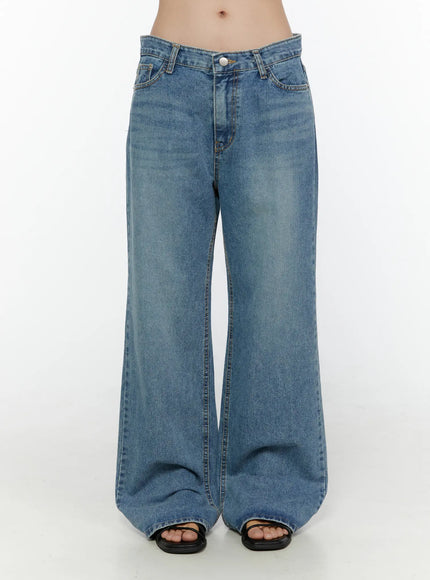 LEWKIN Vienne Wide Leg Jeans CL521 Blue front view on model Size S, low-rise waistband with button closure, wide-leg silhouette, washed denim